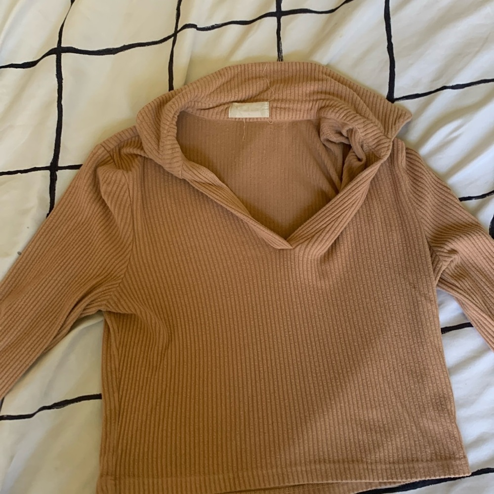 Tan collared V-neck, long sleeve shirt size medium
